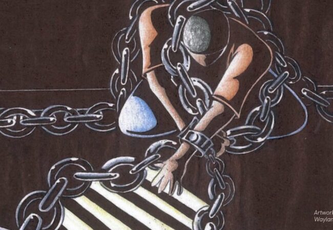 Man in chain touch light from window